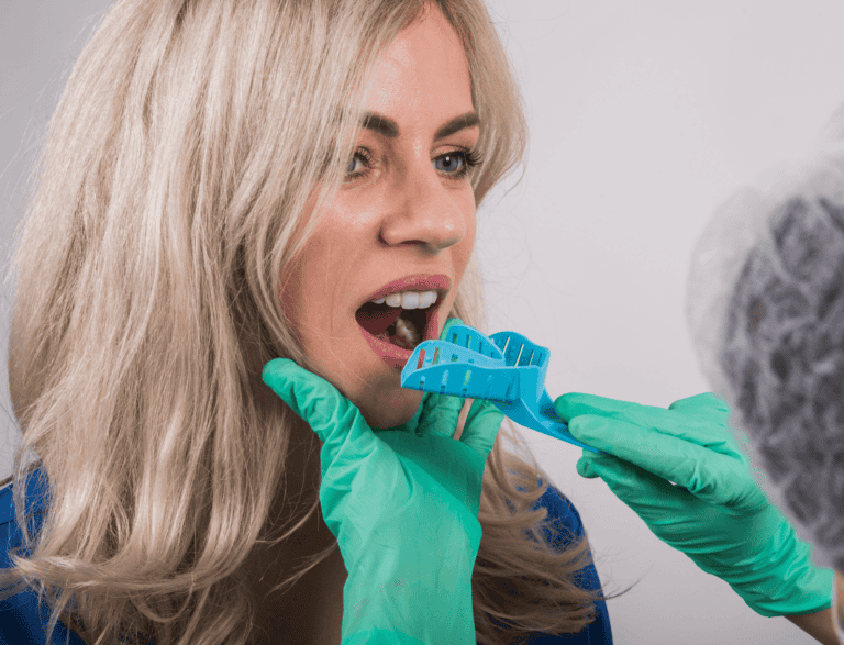 Woman Taking Dentist Treatment | Solomon Family Dentistry in Summerville & Mount Pleasant, SC